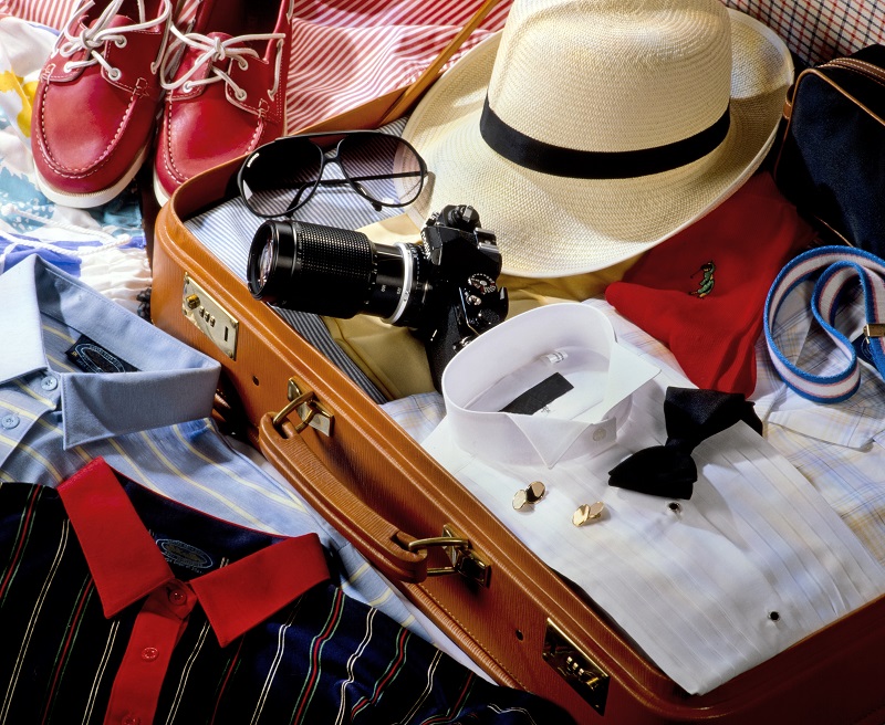 Men's open suitcase with clothes